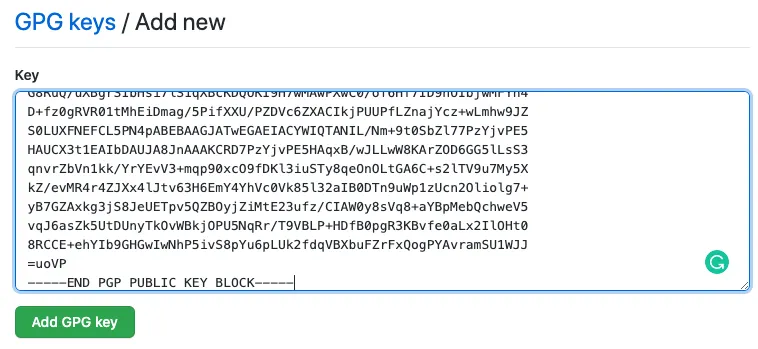 Screenshot of GitHub's 'Add new GPG key' page with a PGP public key pasted into the text box.